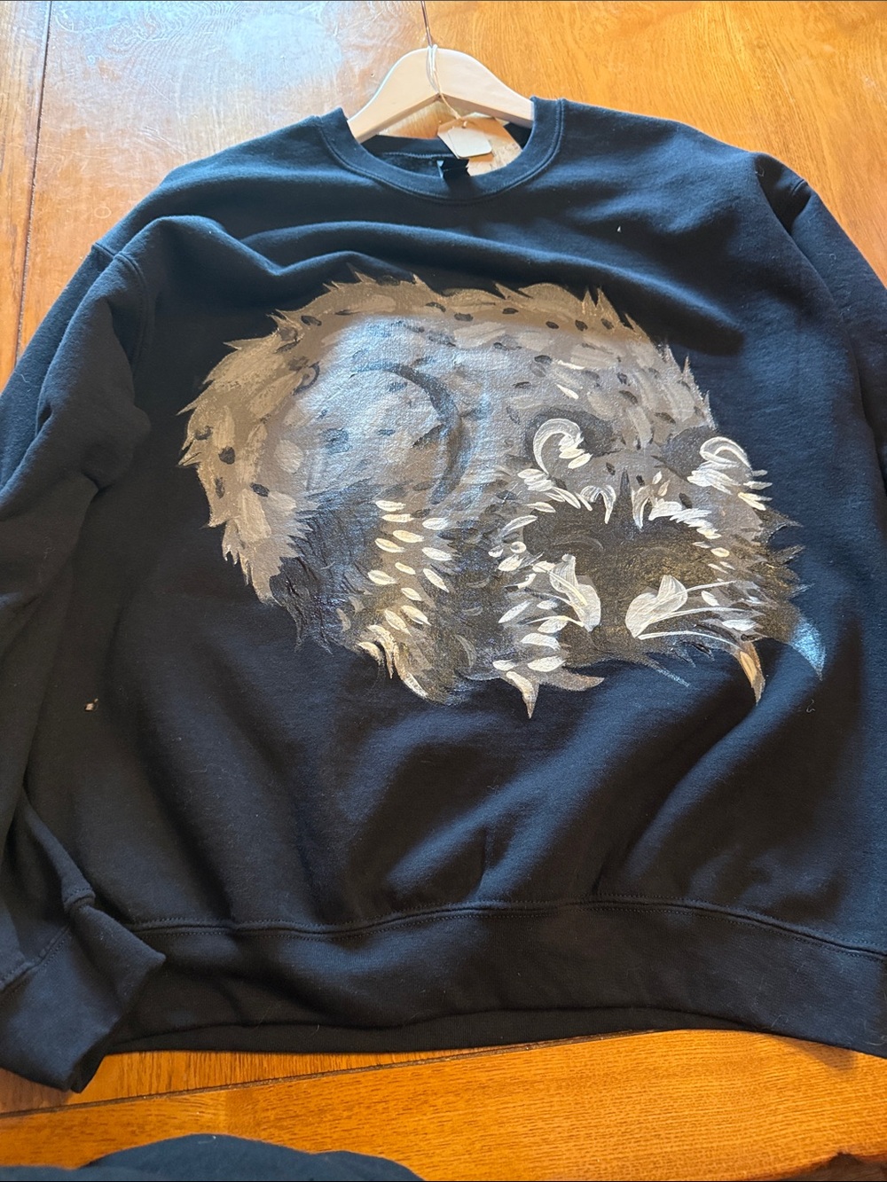 One of a kind hand painted sleeping raccoon sweatshirt